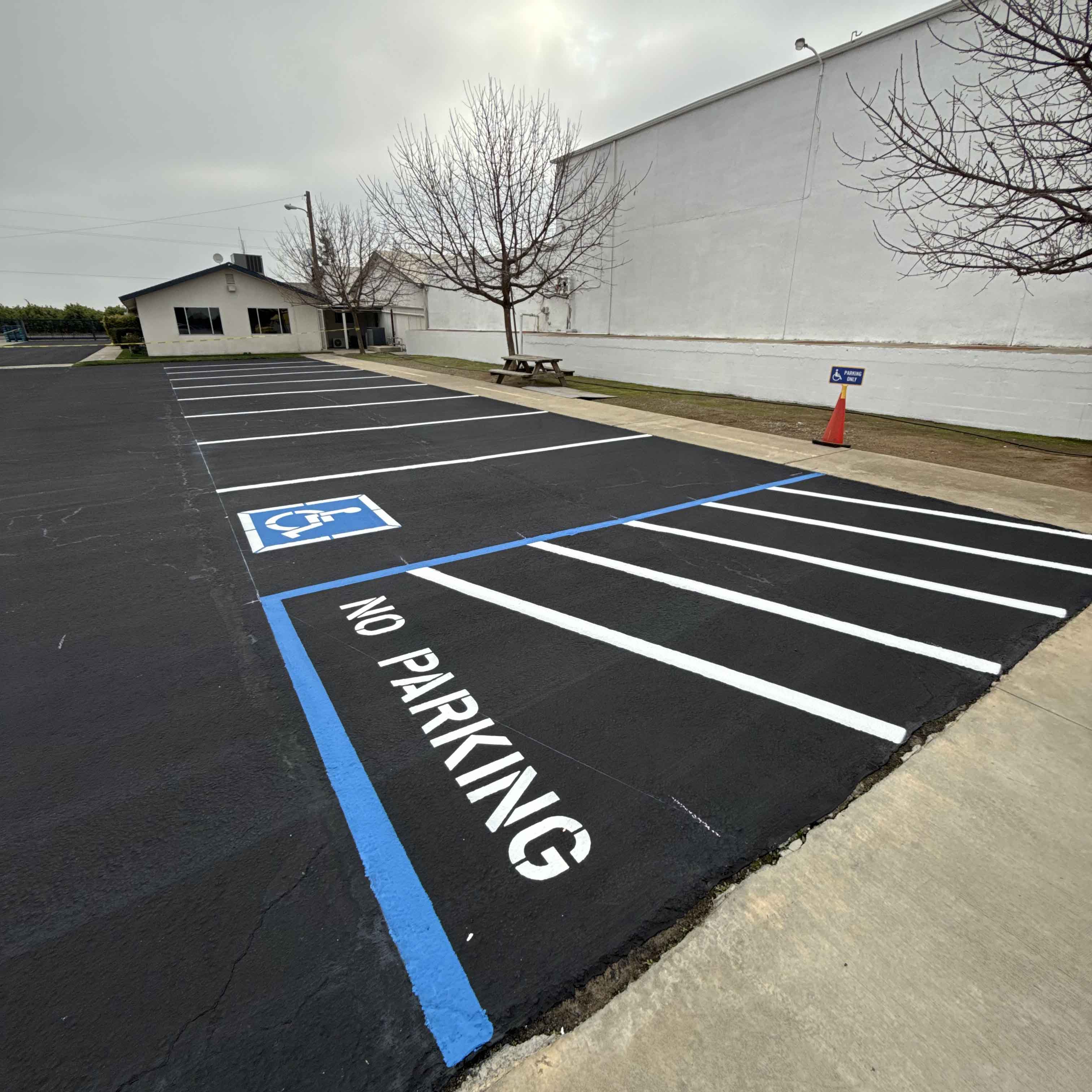 Accessible parking space and fire lane pavement markings
